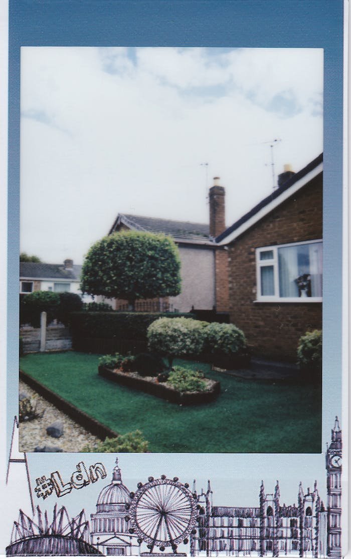 Polaroid of a typical London suburban house with a neat garden.
